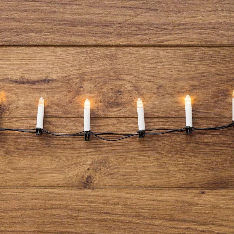 303-085 Neon-Night | Гирлянда светодиодная "Свечи" 10м 50LED тепл. бел. 4Вт 220-240В IP20 провод ПВХ темн. зел.  